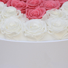 Roses in big round box 